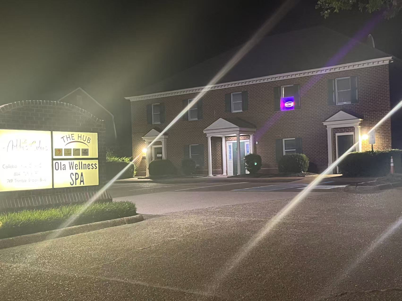 Exterior of Ola Wellness Spa at night